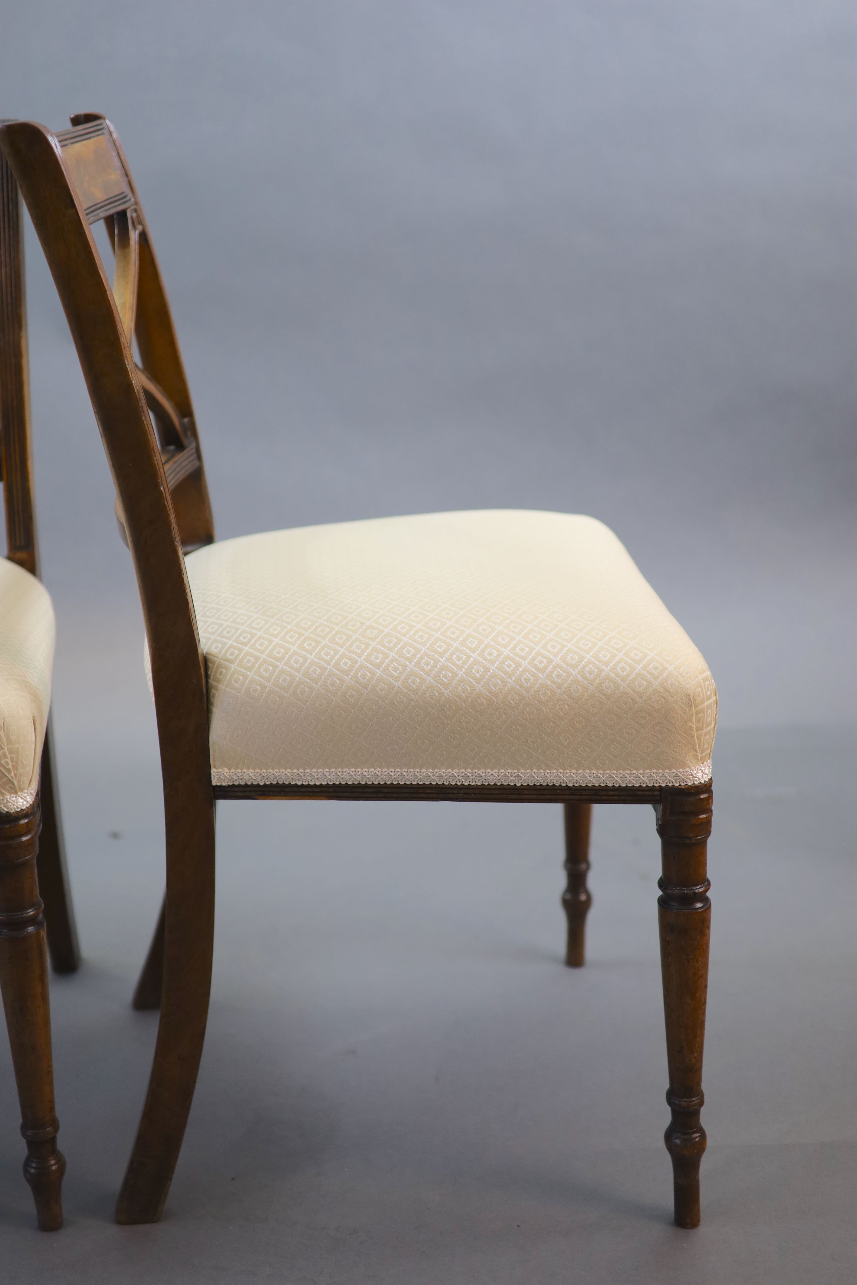 A set of six Regency mahogany dining chairs